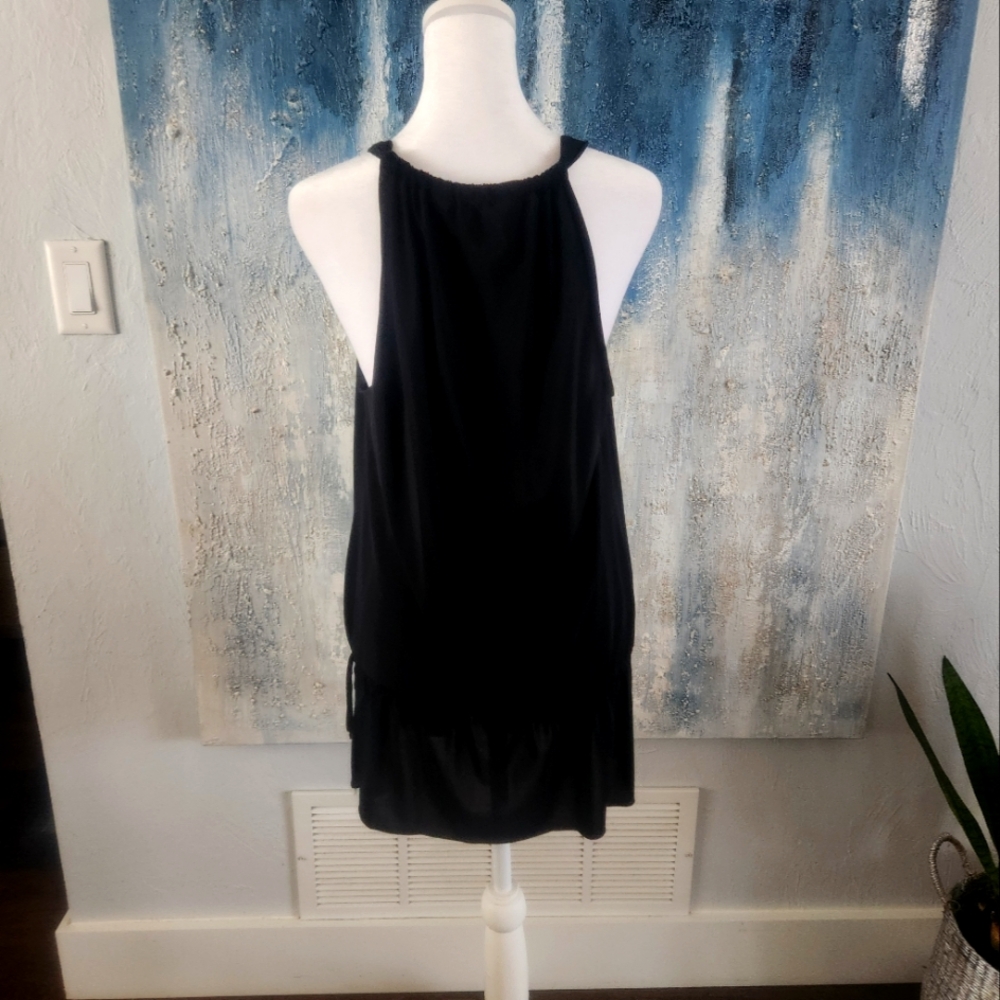 Black Sleeveless Top with tie on the side.